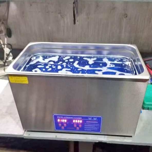 How does an ultrasonic cleaner work? - An Ultrasonic Cleaner in action!